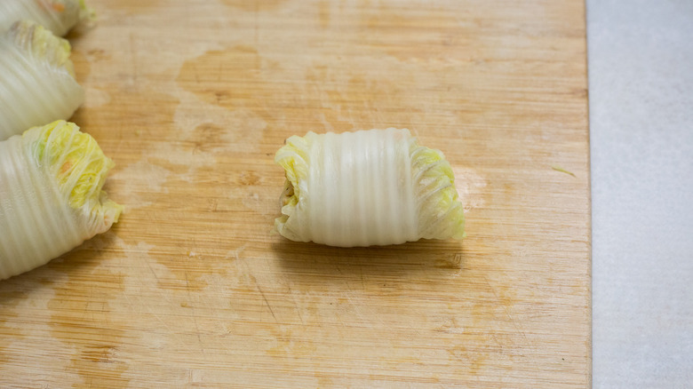 cabbage rolls on wooden board