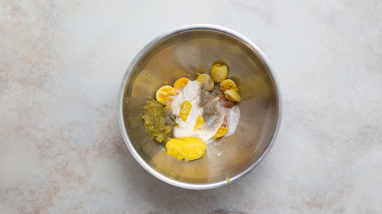 eggs and seasonings in bowl