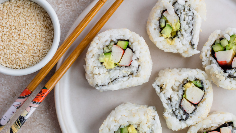 california sushi rolls and chopsticks