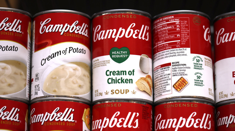 Campbell's soup cans line shelves