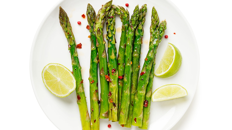 cooked asparagus on plate