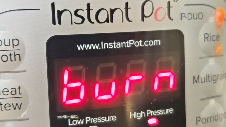 A Intant Pot reading of burn on the front of an Instant Pot