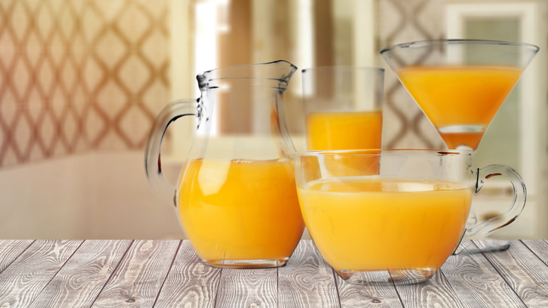 orange juice jug and glasses