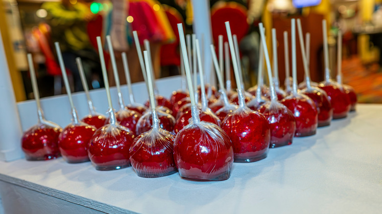 Glossy candy apples plastic wrapped