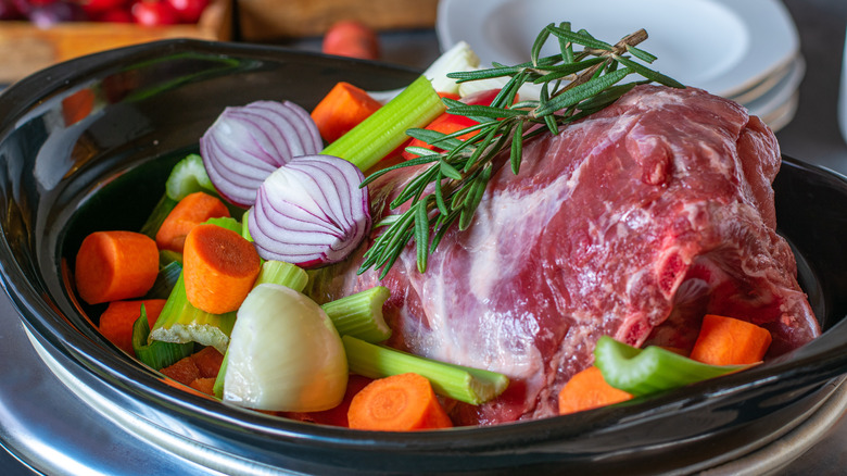 Meat and vegetables in slow cooker