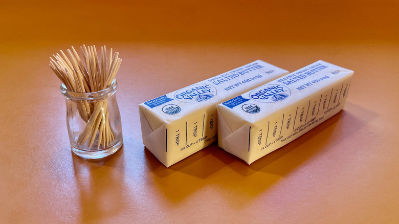 Toothpicks and sticks of butter