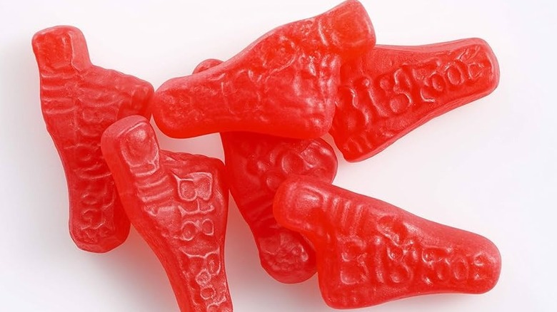 Assorted red Big Foot chewy candies isolated on a white background
