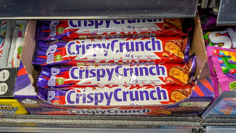 Box of Crispy Crunch candy bars on a store shelf