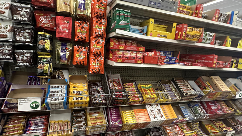 Candy and snack aisle inside a Dollar Tree store in Alberta, Canada