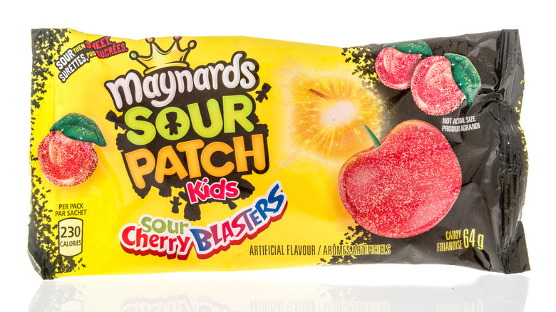 Package of Maynards Sour Patch Kids Sour Cherry Blasters candy on an isolated white background