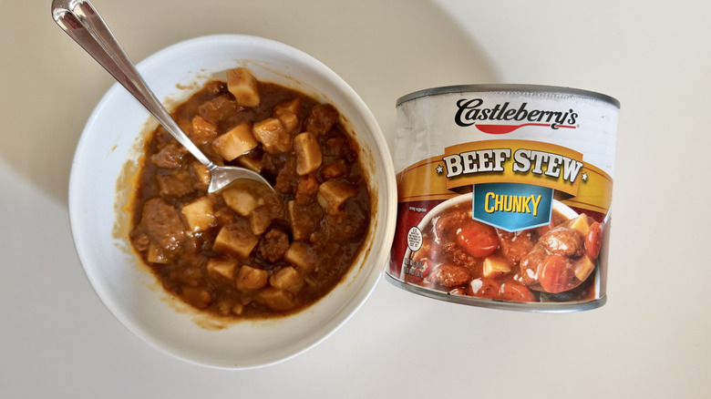 Can and bowl of Castleberry's beef stew in a bowl.