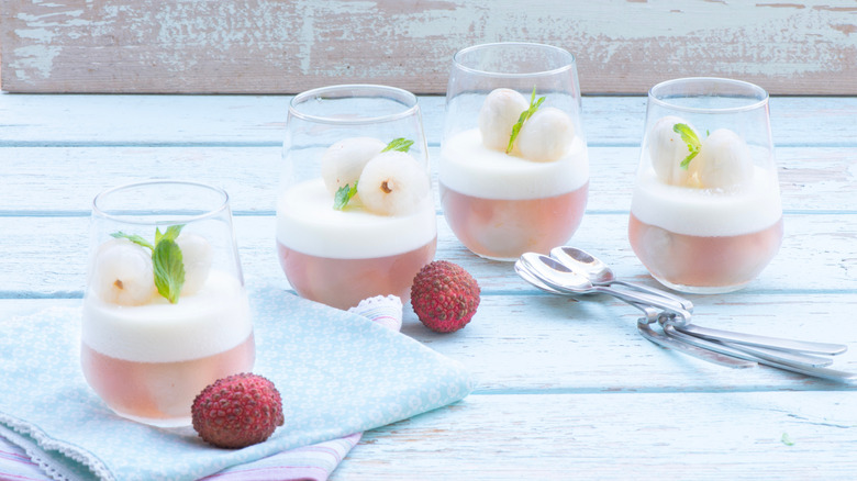 lychee panna cotta and jelly in dessert glasses