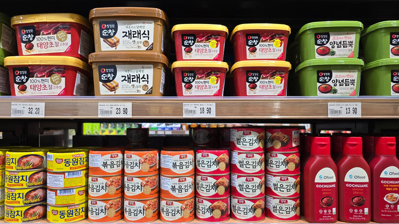 containers of gochujang inside of Korean food store
