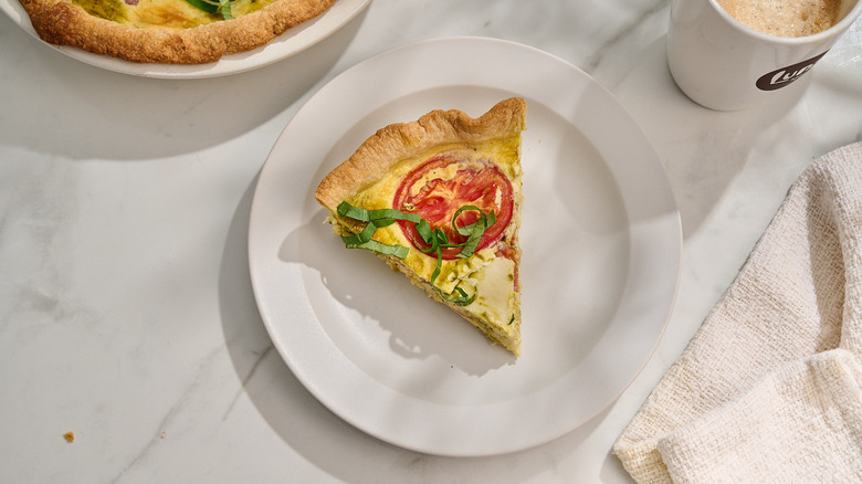 slice of caprese quiche on a plate