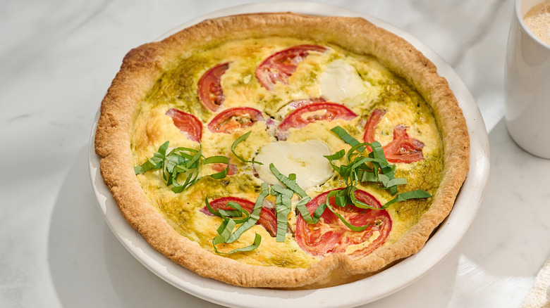 quiche topped with basil