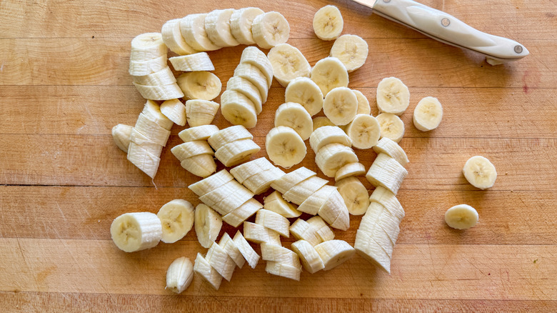 sliced bananas on board