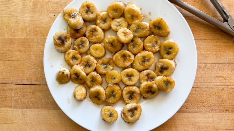 Caramelized banana slices on plate