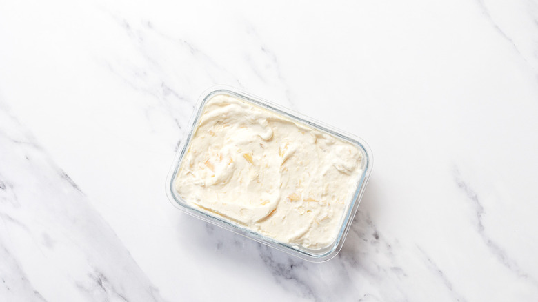 Pineapple ice cream in container