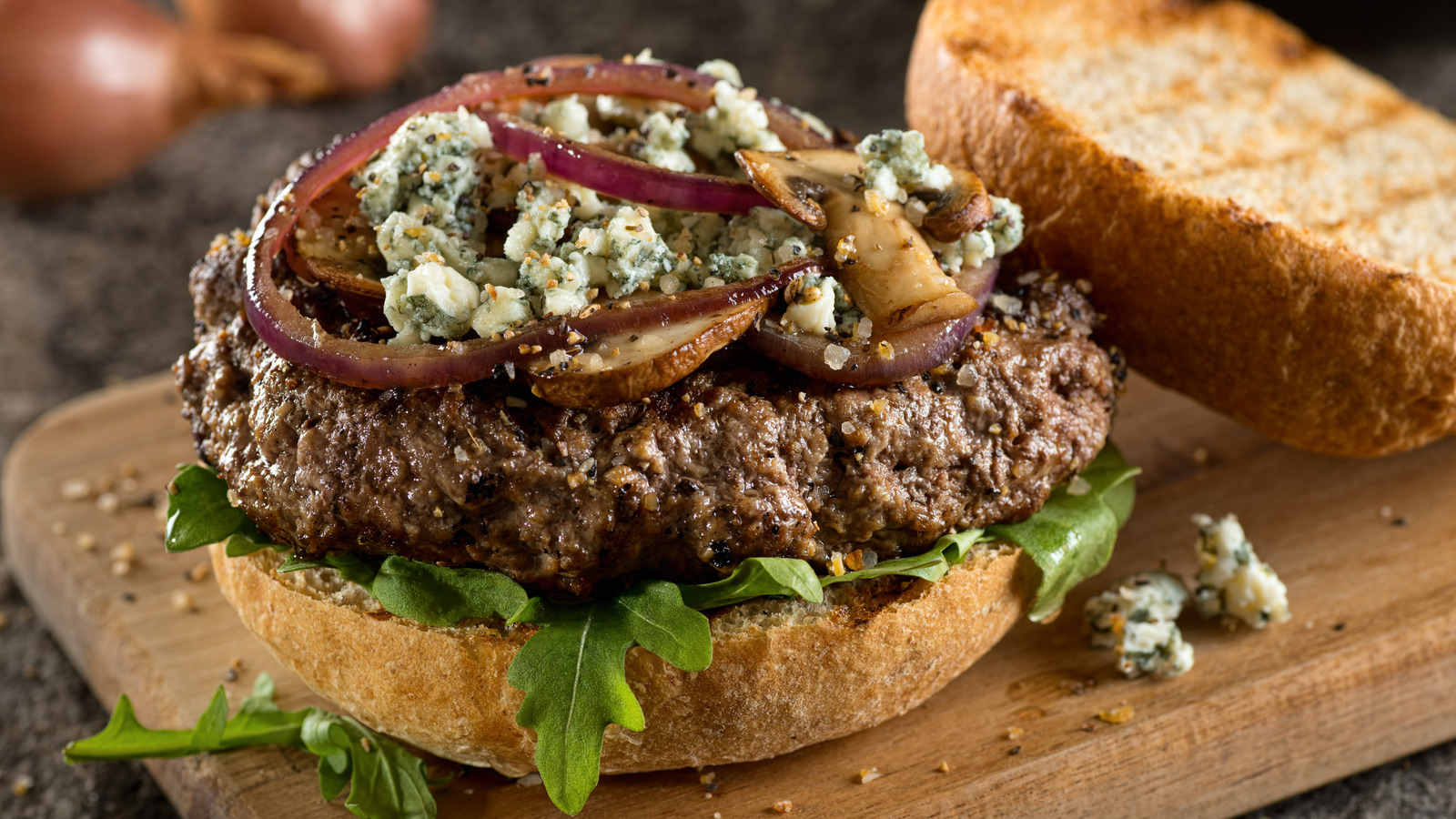 Caramelized Red Onions Are The Unlikely Topping Your Burgers Need - Tasting Table