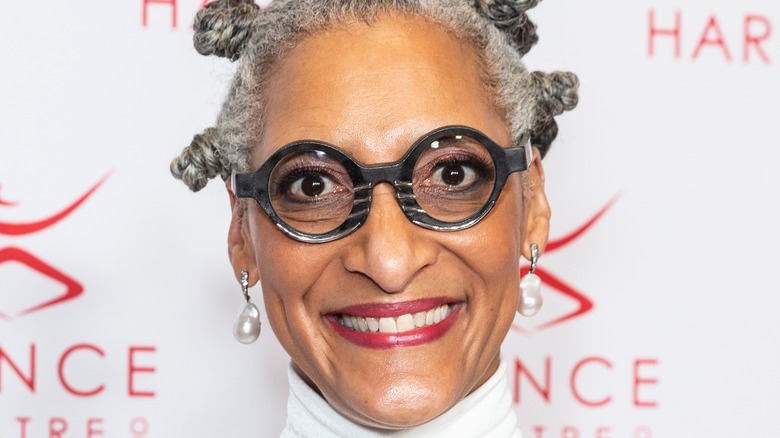 Carla Hall smiling at event