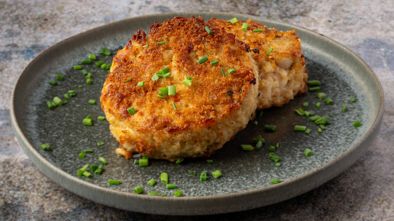 two crab cakes on plate