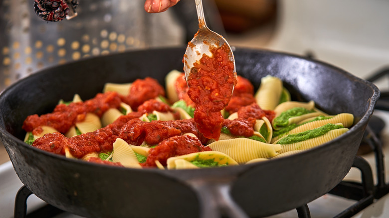 Acidic tomatoes in cast iron skillet