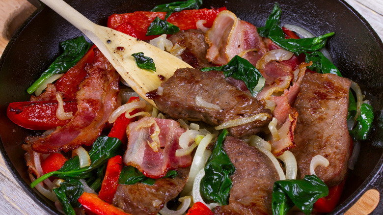 Cast iron pan with stir-fry