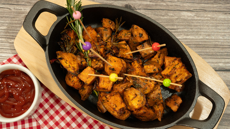 Potatoes in black cast iron pan