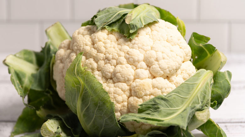 Head of cauliflower on table