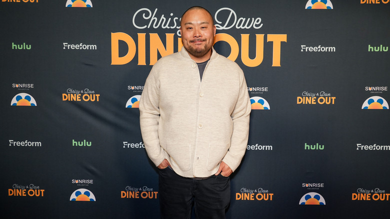 David Chang posing for photo at event