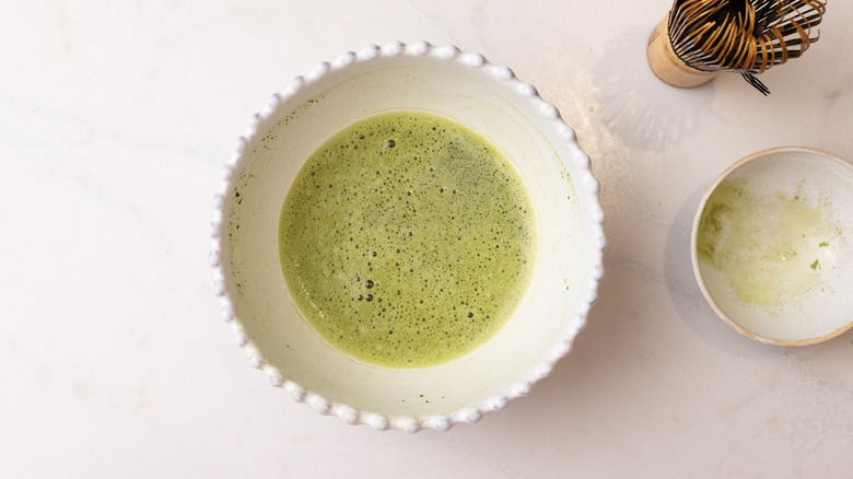whisked matcha in a bowl