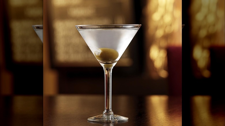 Dirty martini with one olive