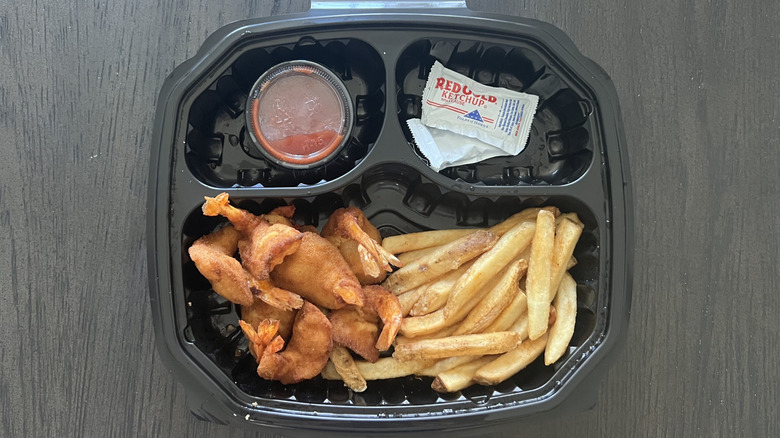 Red Lobster's Walt's favorite shrimp with fries and sauce in a to-go container