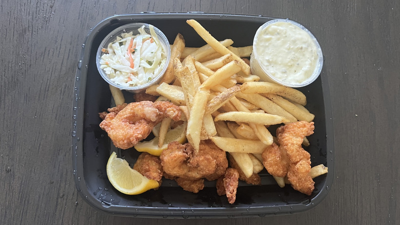Applebee's double crunch shrimp meal with fries and coleslaw in a to-go container