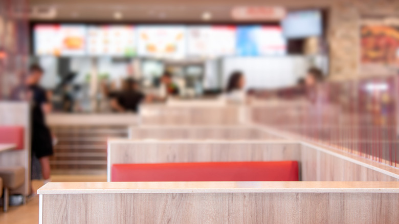 Blurry photo of the inside of a fast food restaurant