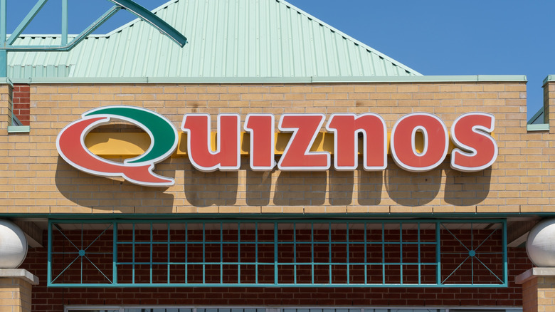 Quiznos on brick building