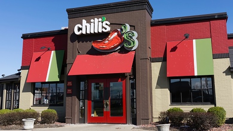Chili's signage on outside entrance of restaurant