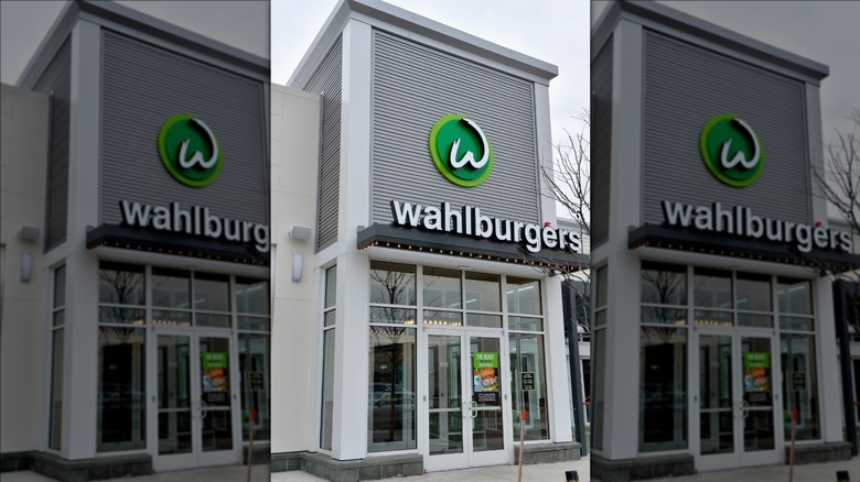 Sign above the entrance of a Wahlburgers location