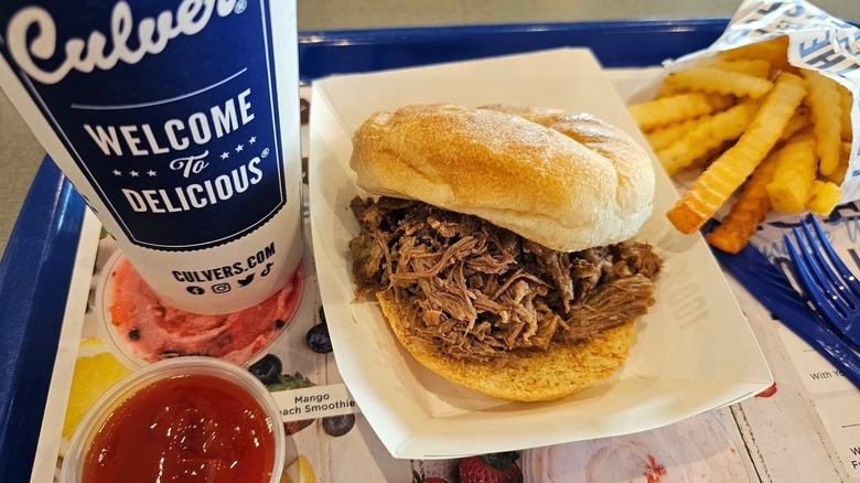a Culver's beef pot roast sandwich with fries and a drink