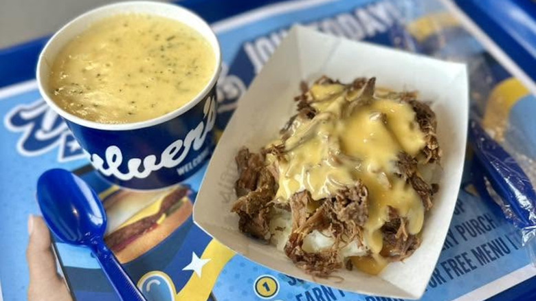 A Culver's cup of cheddar broccoli soup and a beef pot roast with mashed potatoes and cheese