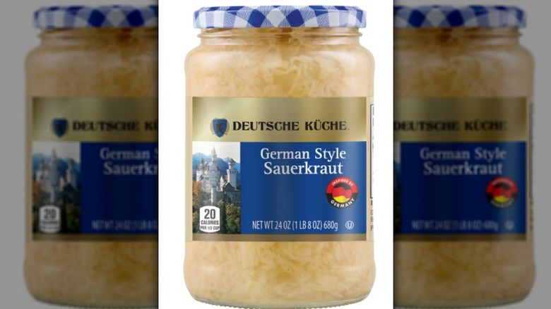 Sauerkraut in a jar on a white background
