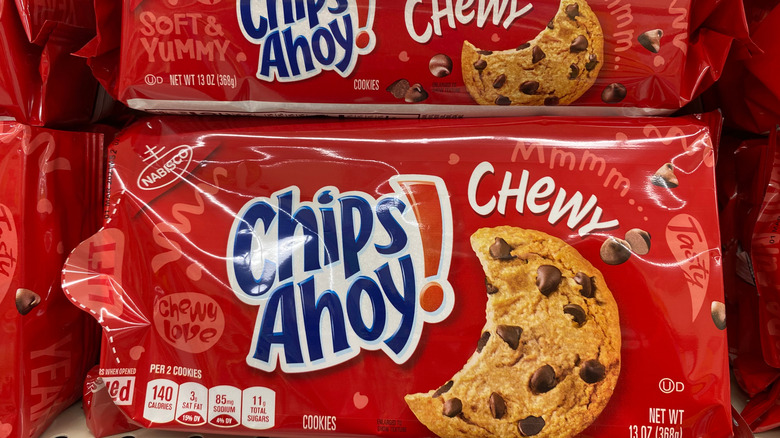 Several packages of Chewy Chips Ahoy! cookies on a grocery store shelf