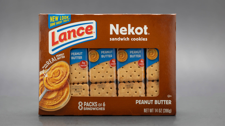 Box of Lance Nekot Peanut Butter Sandwich Cookies with a see-through window showing four sleeves of cookies