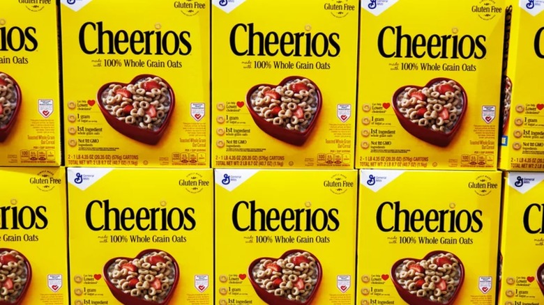 Cheerios boxes on grocer shelr