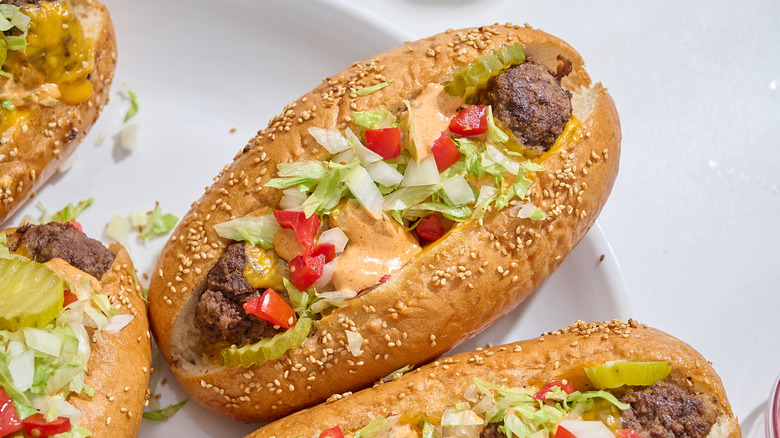 cheeseburger meatball sub on a platter