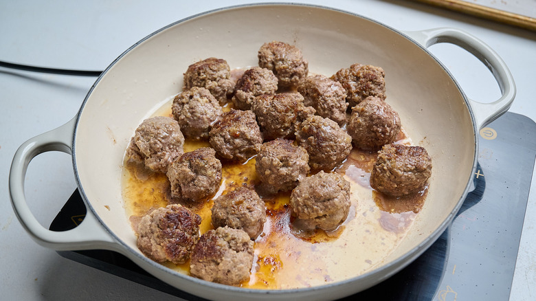 cooked meatballs in a skillet