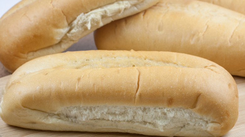 Several hoagie bread rolls piled together