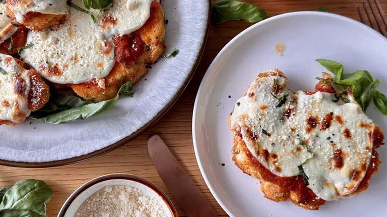 Crispy cauliflower Parmesan on white dishes