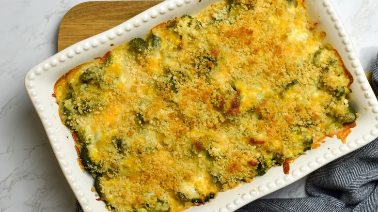 Elevated chicken divan in a white casserole dish