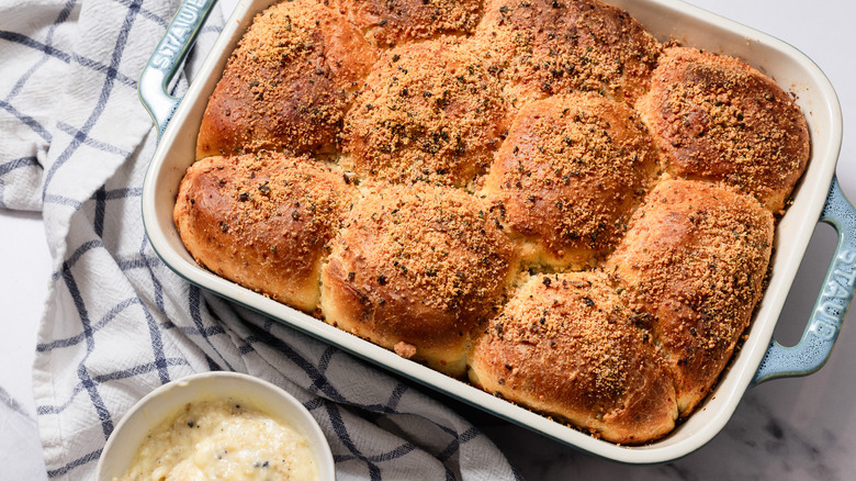 Cheesy garlic buns with tablecloth and compound garlic butter